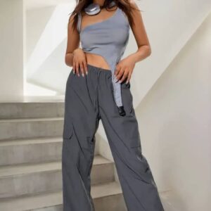 Conjunto de dos piezas de blusa asimétrica y pantalón ancho